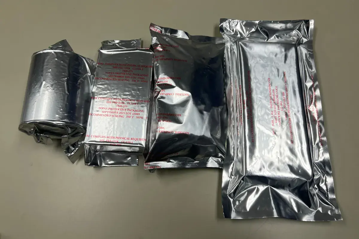Assorted vacuum sealed barrier foil pouches in different sizes for corrosion protection.