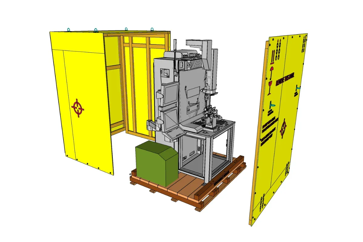 3D model of a machine positioned on a wooden skid with modular crate panels removed